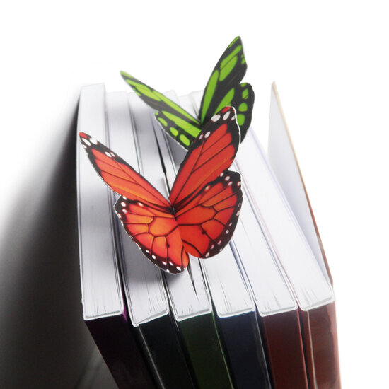 plexiglas display gevuld met  9 vlinder boekenleggers